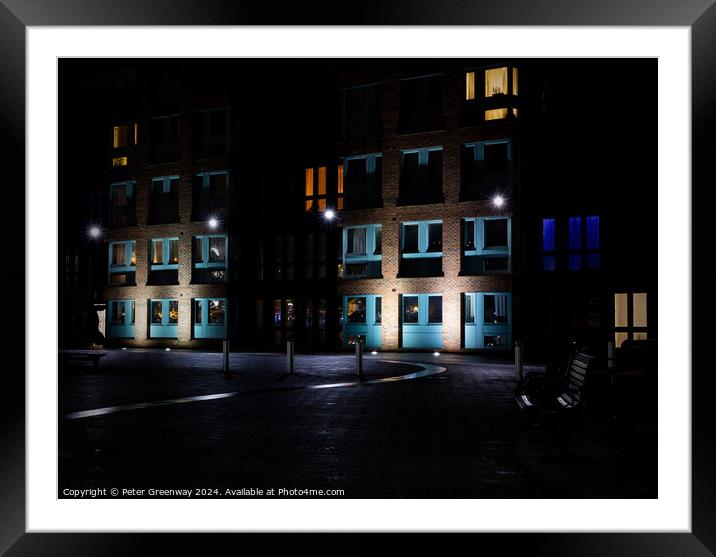 Seating Outside Illuminated Apartments At The Historic Docks At  Framed Mounted Print by Peter Greenway