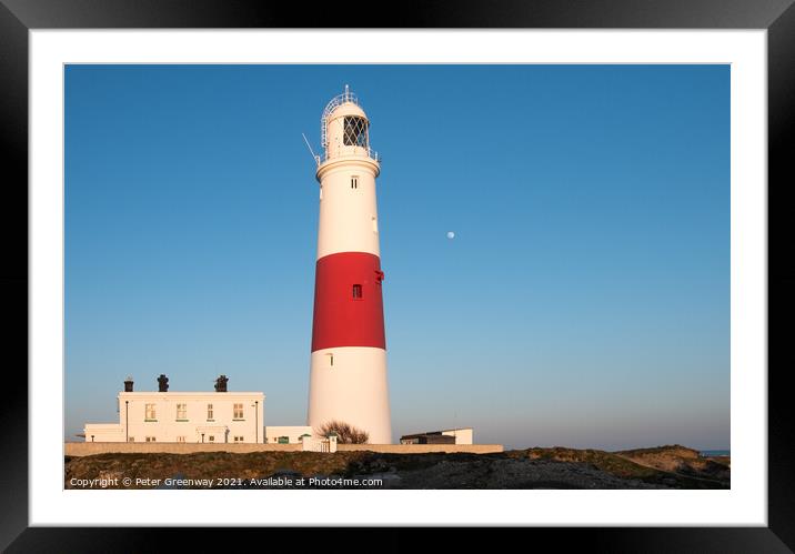 The Moon Behind The Iconic Lighthouse At Portland Bill, Dorset At Sunset Framed Mounted Print by Peter Greenway