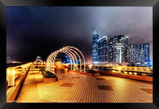 Illuminated Arches & Skyline Around Kowloon Harbour, Hong Kong Framed Print by Peter Greenway
