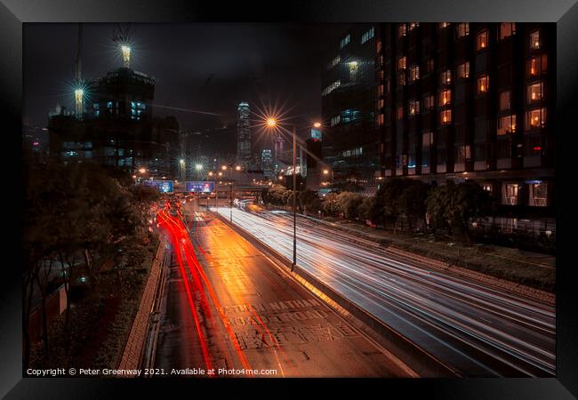 Tsim Sha Tsui Traffic Light Traces Along The Nathan Road, Hong Kong Framed Print by Peter Greenway