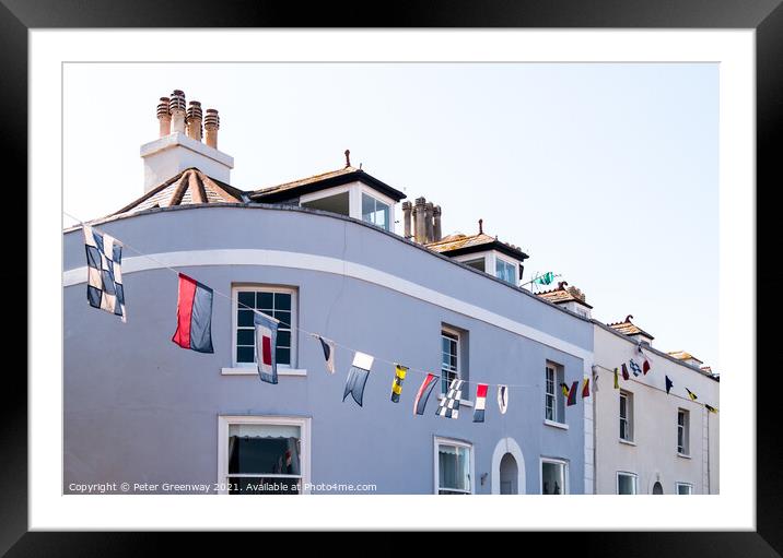 Regatta Bunting Flying Outside Cottages In Shaldon Framed Mounted Print by Peter Greenway