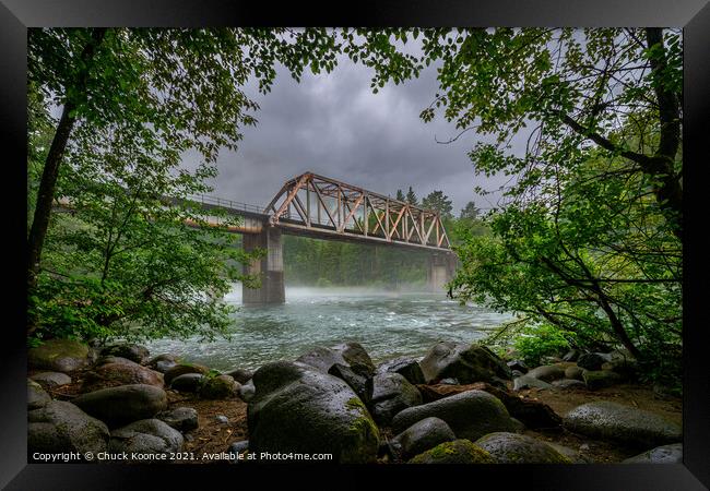 Rail road bridge over the Skykomish River Railroad in Western Washington state. Framed Print by Chuck Koonce