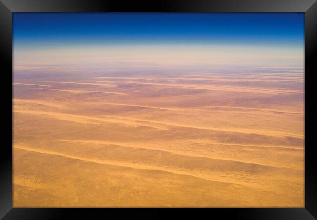 Aerial airplane view of barren Sahara desert landscape in Egypt Framed Print by Mirko Kuzmanovic