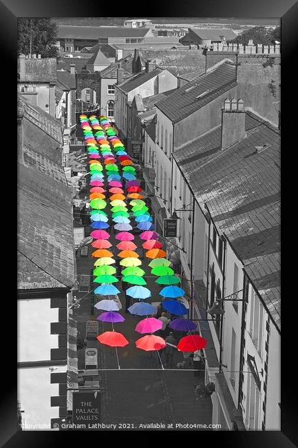Caernarfon Umbrellas Framed Print by Graham Lathbury