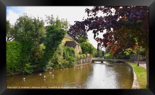 Bourton on the Water Framed Print by Graham Lathbury