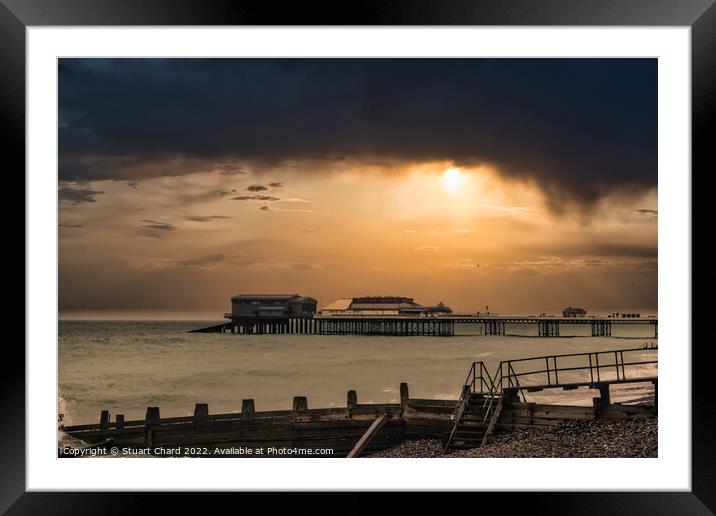 A sunset over Cromer pier in winter Framed Mounted Print by Stuart Chard