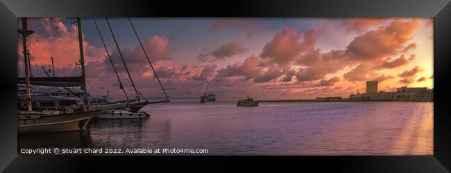 Rhodes harbor at sunset Framed Print by Stuart Chard