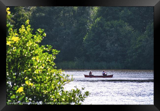 Two men in a boat Framed Print by Stuart Chard