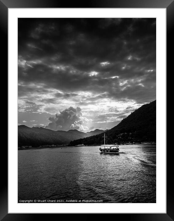 Boat and mountains at sunset - black and white Framed Mounted Print by Stuart Chard