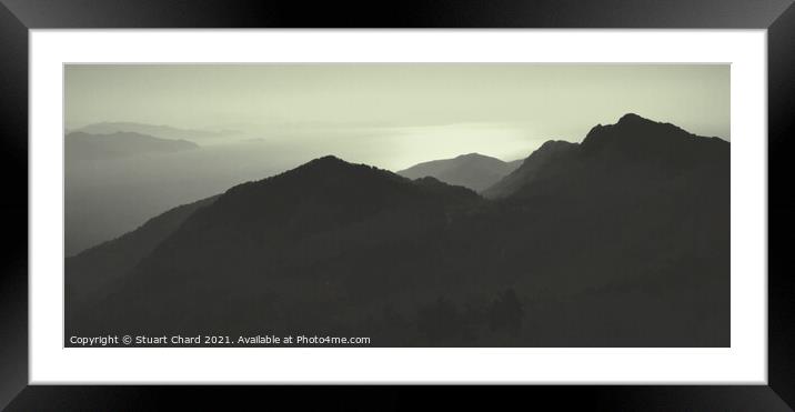 Sunset Over The Mountains Silhouette Of A Mountain Range Against The Sky Panorama Framed Mounted Print by Stuart Chard