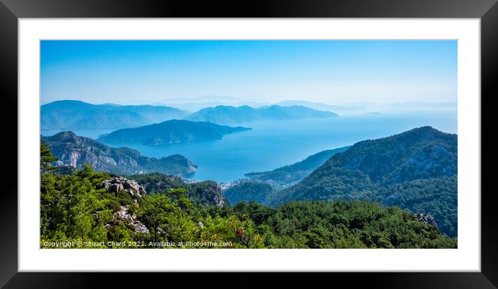 Panoramic  view of turquoise sea and mountains Framed Mounted Print by Stuart Chard