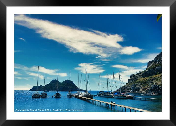 Bay with boats on a jetty Framed Mounted Print by Stuart Chard