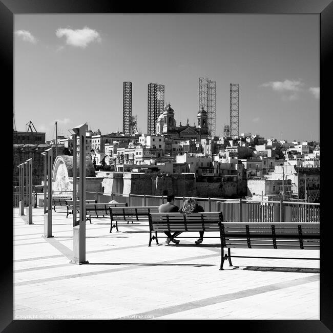 Couple on a bench in Birgu Vittoriosa Malta  Framed Print by Stuart Chard