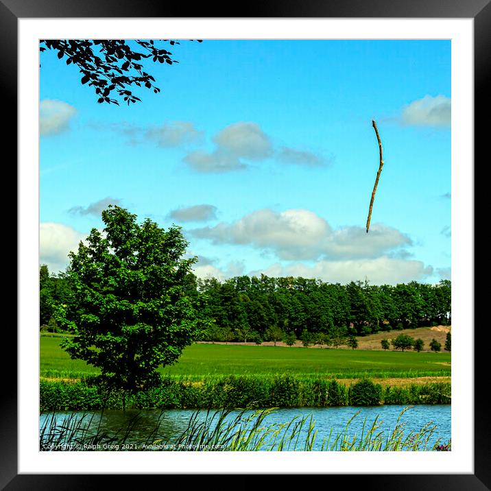 The magical stick Framed Mounted Print by Ralph Greig