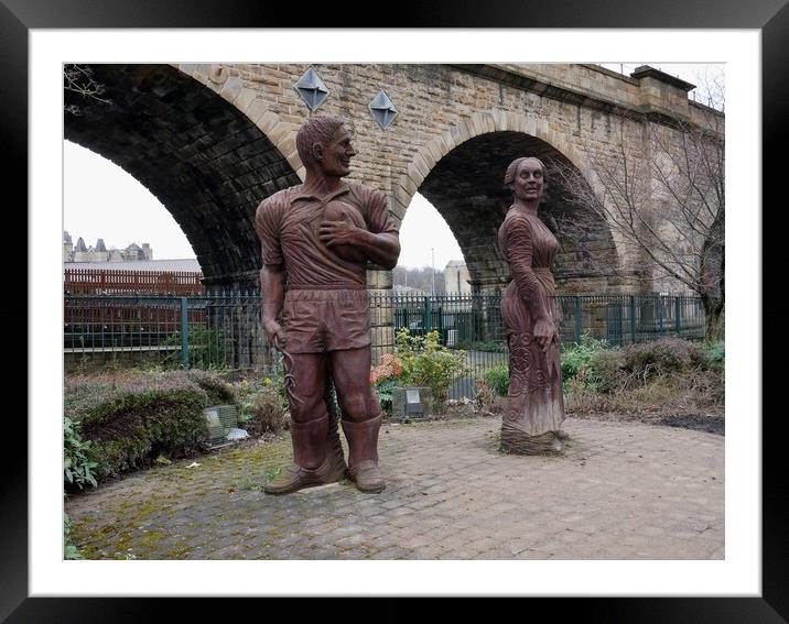 Sculptures of man and woman in Dewsbury Framed Mounted Print by Roy Hinchliffe