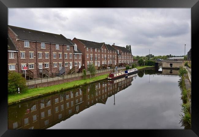 Building reflections in Wakefield canal Framed Print by Roy Hinchliffe