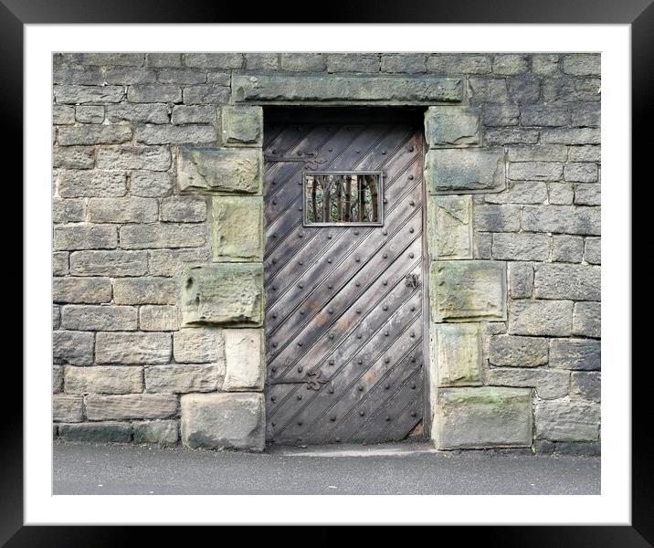 Door in walled garden Framed Mounted Print by Roy Hinchliffe
