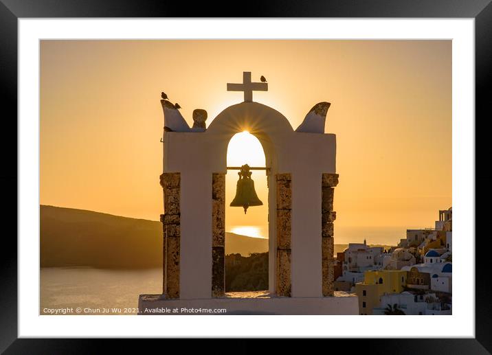 Bell tower with warm sunset light in Oia, Santorini, Greece Framed Mounted Print by Chun Ju Wu