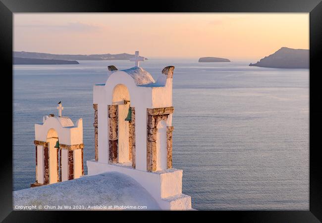 Bell tower with warm sunset light in Oia, Santorini, Greece Framed Print by Chun Ju Wu