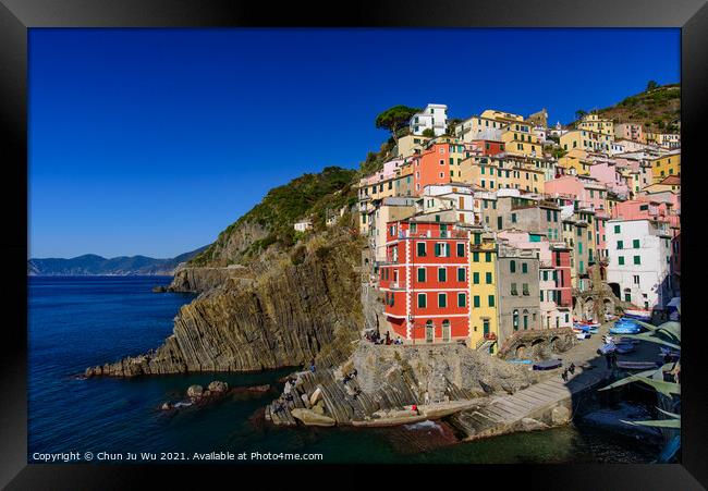 Riomaggiore, one of the five Mediterranean villages in Cinque Terre, Italy, famous for its colorful houses Framed Print by Chun Ju Wu