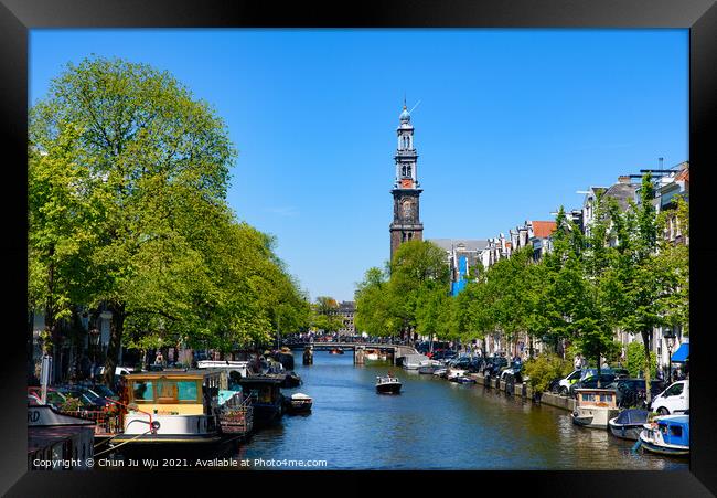 Buildings and boats along the canal in Amsterdam, Netherlands Framed Print by Chun Ju Wu