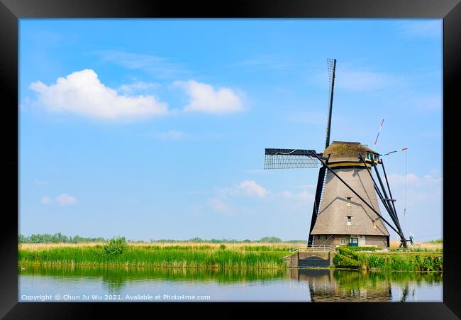 The windmills in Kinderdijk, a UNESCO World Heritage site in Rotterdam, Netherlands Framed Print by Chun Ju Wu