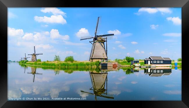 Panorama of the windmills and the reflection on water in Kinderdijk, a UNESCO World Heritage site in Rotterdam, Netherlands Framed Print by Chun Ju Wu