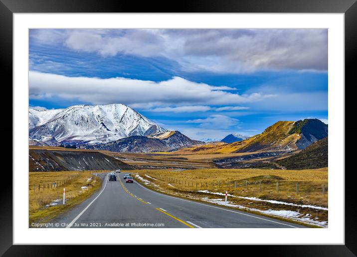 Road trip in winter with snow mountains at backgro Framed Mounted Print by Chun Ju Wu