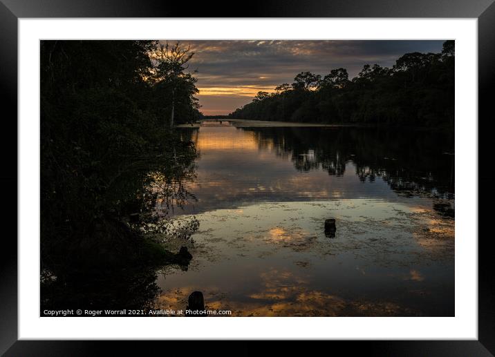 Sunset Reflection Framed Mounted Print by Roger Worrall