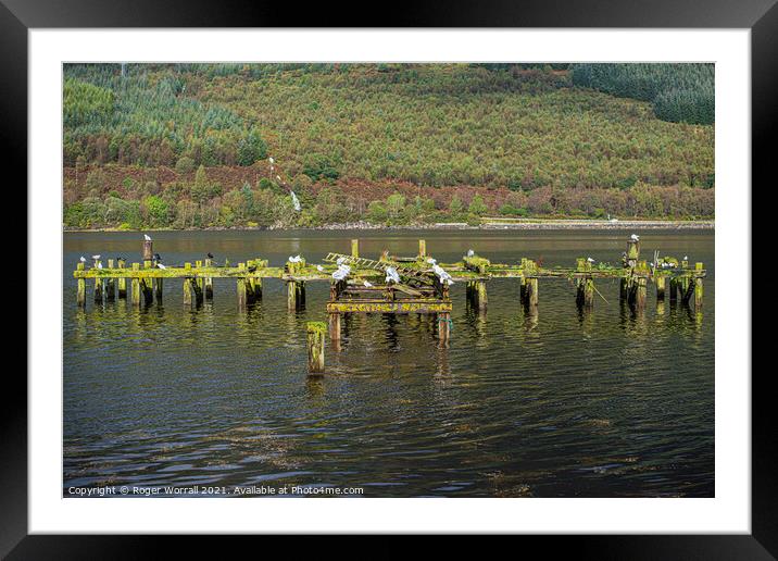 Pier Remains Framed Mounted Print by Roger Worrall