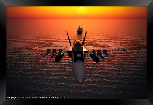 F/A-18 Super Hornet and aircraft carrier at sunset Framed Print by Nic Croad