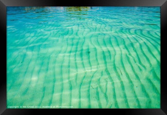 Sand ripple patters in a clear sea Framed Print by Nic Croad