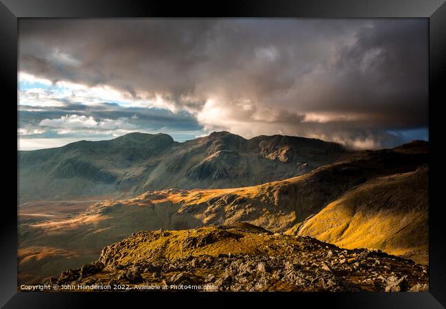 Scafells sunset from the Crinkle Crags ridge. Framed Print by John Henderson