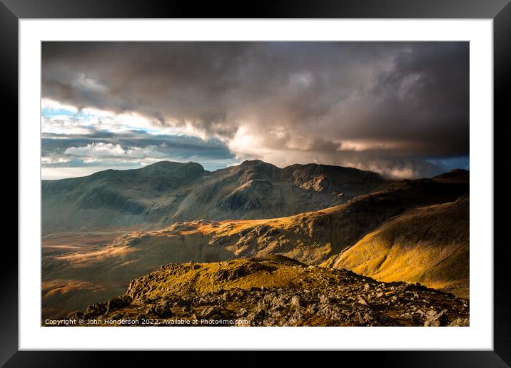 Scafells sunset from the Crinkle Crags ridge. Framed Mounted Print by John Henderson