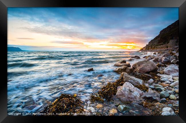 LLandudno West shore sunset Framed Print by John Henderson