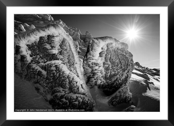 Ice and rock Framed Mounted Print by John Henderson