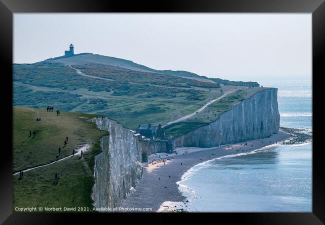 Seven Sisters with Lighthouse Framed Print by Norbert David