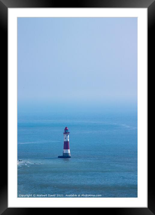 Guiding Beacon Amidst Sea's Serenity Framed Mounted Print by Norbert David