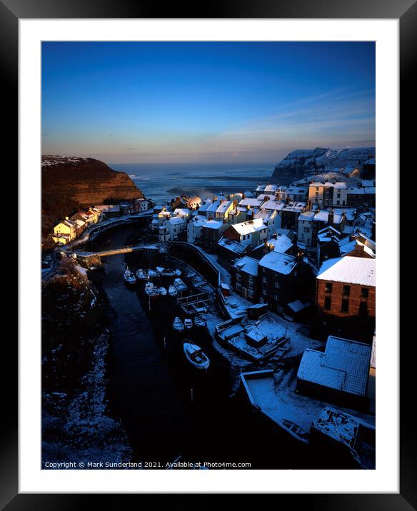 Snow Covered Rooftops at Staithes Framed Mounted Print by Mark Sunderland