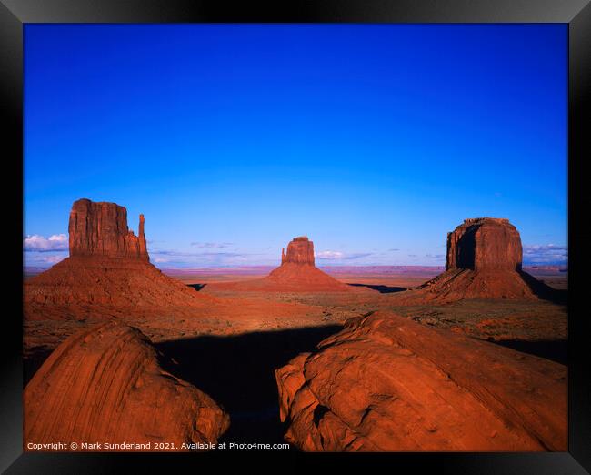 The Mittens and Merrick Butte at Sunset Monument Valley Framed Print by Mark Sunderland