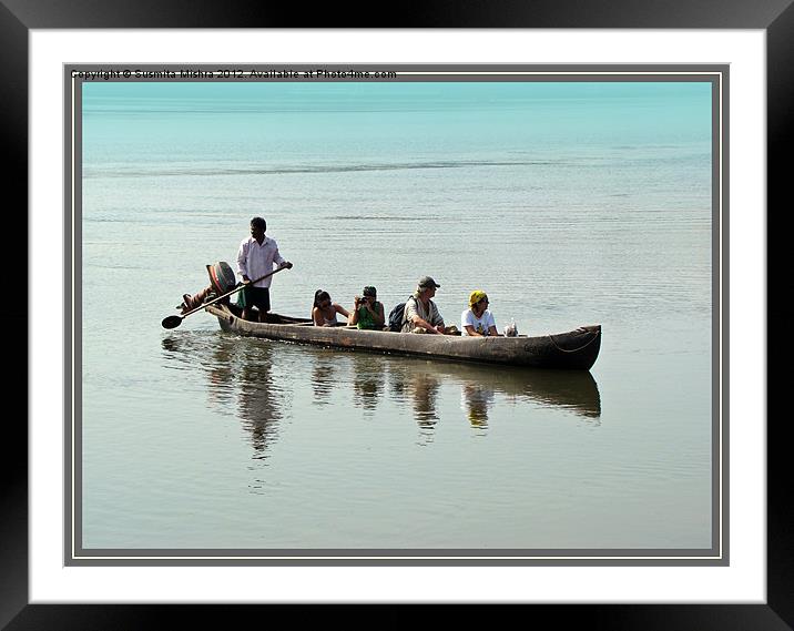 Tourists in a Log Boat Framed Mounted Print by Susmita Mishra