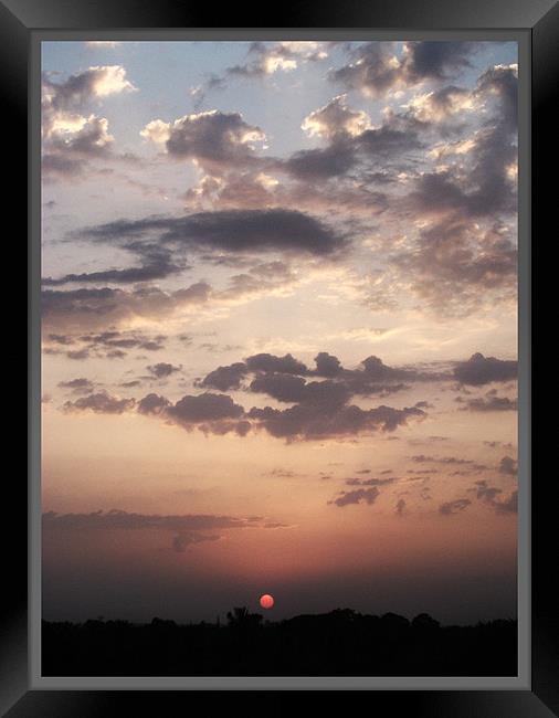 monsoon clouds Framed Print by Susmita Mishra