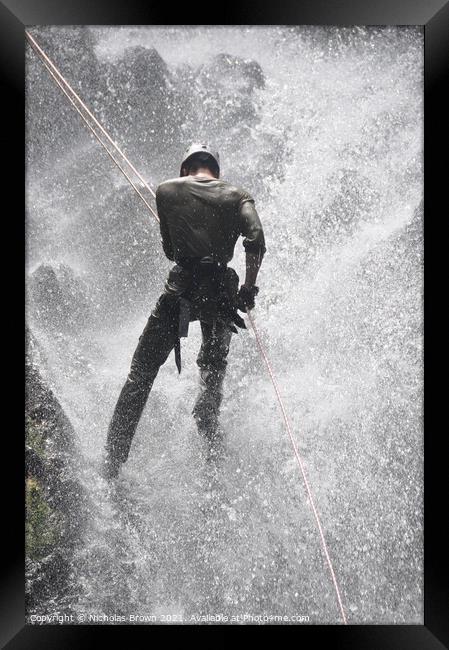 Waterfall Abseil Framed Print by Nicholas Brown