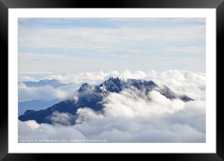 Sincholagua shrouded in cloud Framed Mounted Print by Nicholas Brown