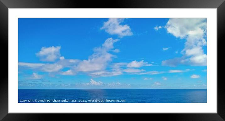 clam and blue ocean and beautiful sky Framed Mounted Print by Anish Punchayil Sukumaran
