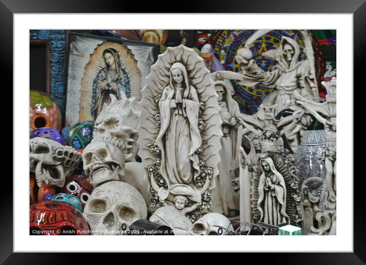  sculpture of Jesus along with other statues in a shop Framed Mounted Print by Anish Punchayil Sukumaran