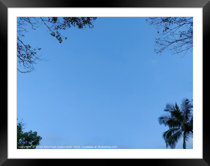blue sky and tree on each corners,  Framed Mounted Print by Anish Punchayil Sukumaran