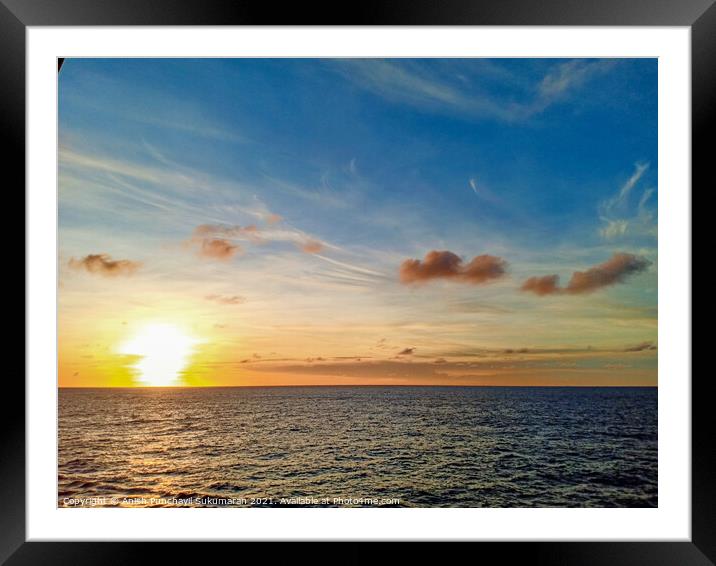sunset and yellow sky and ocean Framed Mounted Print by Anish Punchayil Sukumaran