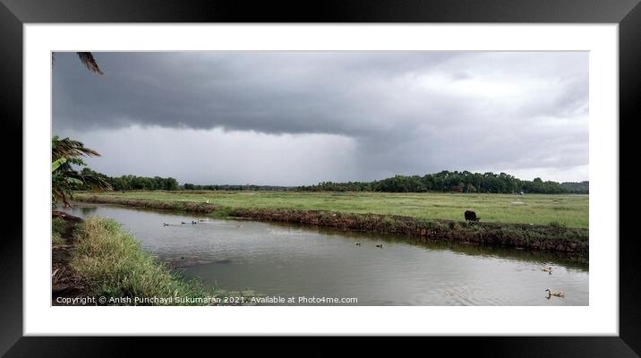 cloudy sky and clam river Framed Mounted Print by Anish Punchayil Sukumaran