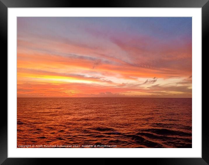 beautiful sunset in ocean and cloudy sky Framed Mounted Print by Anish Punchayil Sukumaran